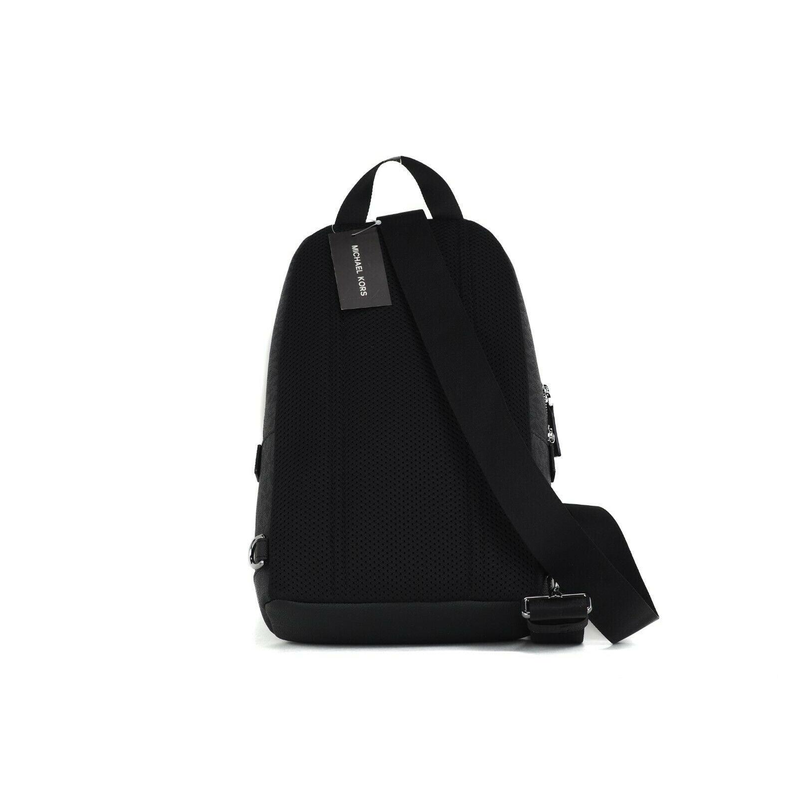 Cooper Medium Signature PVC Varsity Stripe Commuter Slingpack Crossbody Bag (Black Signature/Flame Red) - coffeewithmee2